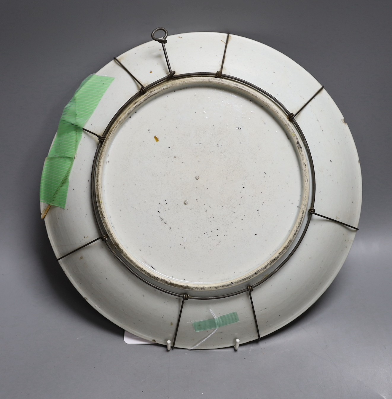 An early 20th century Chinese famille rose charger (a.f) and a Chinese famille verte dish. Largest 36cm